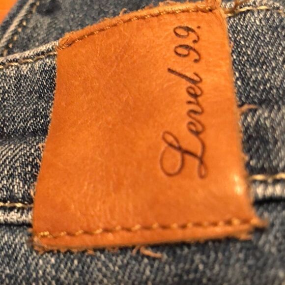 Anthropologie Level 99 button fly, 5-pocket style jeans with raw edge hem. - Picture 6 of 13